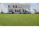 Enjoy this expansive backyard with inviting patio, perfect for outdoor entertaining and relaxation at 19966 Chatham Green Dr, Westfield, IN 46074