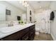 Bathroom with a double vanity, modern fixtures, and a shower-tub combo, perfect for everyday convenience at 19966 Chatham Green Dr, Westfield, IN 46074