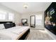 A comfortable bedroom featuring a makeup vanity, and a neutral palette at 19966 Chatham Green Dr, Westfield, IN 46074
