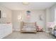 bedroom with a golden crib, creative lighting and storage at 19966 Chatham Green Dr, Westfield, IN 46074