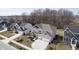 Charming two-story home featuring a covered porch, two-car garage, and manicured landscaping at 19966 Chatham Green Dr, Westfield, IN 46074