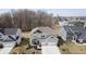Beautiful home featuring a well-manicured front yard, long driveway and three-car garage at 19966 Chatham Green Dr, Westfield, IN 46074