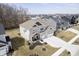 Charming two-story home featuring manicured lawn, driveway, and three-car garage at 19966 Chatham Green Dr, Westfield, IN 46074