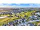 Gorgeous aerial view showcasing the community's lush landscaping, winding golf course, and peaceful ponds at 2199 Somerset Dr, Franklin, IN 46131
