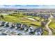 Stunning aerial view of the community featuring lush green fairways and picturesque ponds at 2199 Somerset Dr, Franklin, IN 46131