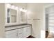 Elegant bathroom with double sinks, white cabinetry, and modern fixtures for a luxurious feel at 2199 Somerset Dr, Franklin, IN 46131