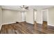 Spacious bedroom with hardwood floors, ceiling fan, and access to the ensuite bathroom at 2199 Somerset Dr, Franklin, IN 46131