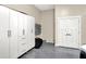 Clean garage featuring storage cabinets and speckled flooring, offering ample space at 2199 Somerset Dr, Franklin, IN 46131