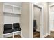 Functional mud room with a built-in bench, coat hooks, and additional storage at 2199 Somerset Dr, Franklin, IN 46131