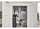 Well-organized utility room featuring the water heater, furnace and water softener at 2199 Somerset Dr, Franklin, IN 46131