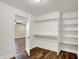 Organized walk-in closet featuring built-in shelving and hanging rods at 2199 Somerset Dr, Franklin, IN 46131