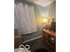 Bedroom featuring a wood media center and neutral color palette at 245 E Plum St, Anderson, IN 46012