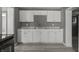 Bright kitchen showcasing white cabinetry, marble countertops, and modern fixtures for a clean and functional space at 3022 Alice Ave, Indianapolis, IN 46237