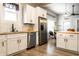 Bright kitchen boasts stainless steel appliances, white cabinets and butcher block countertops at 3732 N Kenwood Ave, Indianapolis, IN 46208