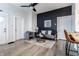 Comfortable living room with stylish furniture, modern design, and wood floors at 3732 N Kenwood Ave, Indianapolis, IN 46208