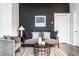 Close-up of stylish living room decor, featuring a comfortable sofa and modern accents at 3732 N Kenwood Ave, Indianapolis, IN 46208