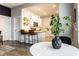 Open-concept living area flows into the kitchen with modern decor and ample seating at 3732 N Kenwood Ave, Indianapolis, IN 46208