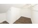 Unfinished attic featuring storage and hardwood floors at 415 Ruskin Pl, Indianapolis, IN 46205