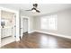 Bedroom with new hardwood floors and a bathroom view at 415 Ruskin Pl, Indianapolis, IN 46205