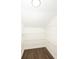 Closet with wire shelving, dark hardwood floors, and white walls at 415 Ruskin Pl, Indianapolis, IN 46205