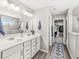 Modern bathroom with double vanity, walk-in shower, and stylish tile accents at 4179 Ironclad Dr, Bargersville, IN 46106