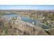 Beautiful aerial view of lakeside homes with private boat docks and autumn foliage at 5901 Crystal Bay West Dr, Plainfield, IN 46168