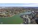 Expansive aerial shot of lakeside houses with boat docks and a tranquil lake setting at 5901 Crystal Bay West Dr, Plainfield, IN 46168