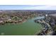Scenic aerial view of waterfront homes, boat docks, and lush greenery by the lake at 5901 Crystal Bay West Dr, Plainfield, IN 46168
