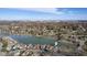 Picturesque aerial scene of waterfront homes surrounded by colorful trees and serene lake at 5901 Crystal Bay West Dr, Plainfield, IN 46168