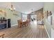 Bright dining area with vaulted ceilings, wood-look floors, and stylish modern furnishings at 5901 Crystal Bay West Dr, Plainfield, IN 46168