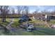 Lake house with a private dock and patio seating area; perfect for waterfront relaxation and entertaining at 5901 Crystal Bay West Dr, Plainfield, IN 46168