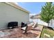 A well-kept backyard, featuring stylish patio furniture and a lush lawn at 5944 Aldridge Dr, Whitestown, IN 46075