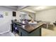 View of basement wet bar, ping pong table and seating area at 5944 Aldridge Dr, Whitestown, IN 46075