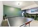 Finished basement with ping pong table and wet bar offers ample space for entertainment at 5944 Aldridge Dr, Whitestown, IN 46075