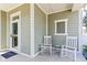 Cozy front porch with rocking chairs, offering a warm welcome at 5944 Aldridge Dr, Whitestown, IN 46075