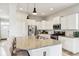 Bright kitchen with stainless steel appliances, granite countertops, and ample cabinet space at 5944 Aldridge Dr, Whitestown, IN 46075