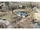 Aerial view of a single-story home, highlighting the roof and surrounding neighborhood at 616 Gibbs Ct, Plainfield, IN 46168