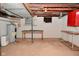 Spacious unfinished basement with utilities and ample space for storage at 616 Gibbs Ct, Plainfield, IN 46168