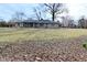 Single story home on a large lot with mature trees, offering privacy and curb appeal at 616 Gibbs Ct, Plainfield, IN 46168