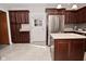Beautiful kitchen showcasing custom cabinetry, stainless steel appliances, and a center island at 616 Gibbs Ct, Plainfield, IN 46168