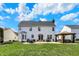 Spacious backyard with a large patio and a charming gazebo, perfect for outdoor gatherings at 6571 Hunters S Rdg, Zionsville, IN 46077