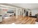 Spacious basement featuring wood flooring and ample lighting, great for recreation and storage at 6571 Hunters S Rdg, Zionsville, IN 46077