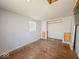 Spacious bedroom has natural light from window and closet space, offering room for customization and storage at 6616 W Thompson Rd, Indianapolis, IN 46241
