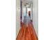Hallway features beautiful hardwood floors awaiting a fresh remodel at 6616 W Thompson Rd, Indianapolis, IN 46241