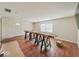 Bright, open living room with hardwood floors is ready for remodeling at 6616 W Thompson Rd, Indianapolis, IN 46241