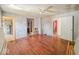 Spacious living room with hardwood floors, needs remodel at 6616 W Thompson Rd, Indianapolis, IN 46241