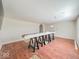 Bright, open living room with hardwood floors is ready for remodeling at 6616 W Thompson Rd, Indianapolis, IN 46241