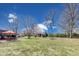 The backyard features a shed and plenty of green space for outdoor activities and relaxation at 7152 Sandalwood Dr, Avon, IN 46123