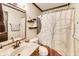 This bathroom features a modern sink, a toilet, and a shower with a modern shower curtain at 7152 Sandalwood Dr, Avon, IN 46123