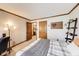 Comfortable bedroom featuring neutral walls, carpet floors, desk area, and closet at 7152 Sandalwood Dr, Avon, IN 46123
